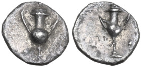 Greek Italy. Southern Apulia, Tarentum. AR Obol, c. 280-228 BC. Obv. Kantharos surrounded by three pellets. Rev. Kantharos; kerykeion to left, four pe...