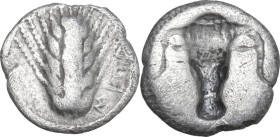 Greek Italy. Southern Lucania, Metapontum. AR Triobol, c. 470-440 BC. Obv. Five-grained barley-ear; MET to right. Rev. Incuse bucranium. HN Italy 1487...