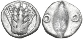 Greek Italy. Southern Lucania, Metapontum. AR Diobol, c. 470-440 BC. Obv. Ear fo barley. Rev. Incuse corn of barley, flanked by two rings. HN Italy 14...