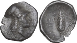 Greek Italy. Southern Lucania, Metapontum. AR Diobol, c. 325-275 BC. Obv. Head of Athena right, wearing Corinthian helmet. Rev. META. Ear of barley, l...