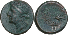Greek Italy. Southern Lucania, Thurium. AE 16 mm, 280-270 BC. Obv. Laureate head of Apollo left. Rev. Winged thunderbolt; below, monogram. HN Italy 19...