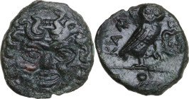 Sicily. Kamarina. AE Onkia, 425-405 BC. Obv. Grogoneion facing. Rev. Owl standing right, head facing, wings closed, holding lizard in claws; in exergu...