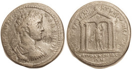 CARACALLA, Lydia, Apollonis, Æ36, Young bust r/ Dionysos stg in 4-column temple; c/mk of Ruler's head in circle before chin; F+, nrly centered, sl lgn...