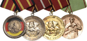 Ordensspangen
Spange mit 4 Auszeichnungen DDR Verdienstmedaille der DDR, Buntmetall versilbert, lackiert. Verdienstmedaille der NVA in Gold, Silber v...