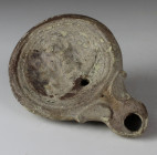 Roman oil lamp depicting a erotic scene, Type Bussière B III 1b