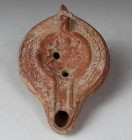 Late Roman / Christian oil lamp depicting a god Nilus or sea monster, Type Bussière E VIII 8