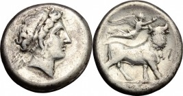 Greek Italy. Central and Southern Campania, Neapolis. AR Didrachm, 420-400 BC. D/ Female head right, wearing wreath. R/ Man-headed bull standing right...