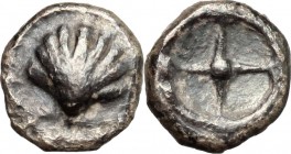 Greek Italy. Southern Apulia, Tarentum. AR Litra, 480-470 BC. D/ Shell. R/ Wheel with four spokes. HN Italy 835. AR. g. 0.71 mm. 8.00 Toned. Good VF.