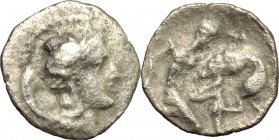 Greek Italy. Southern Apulia, Tarentum. AR Diobol, 380-325 BC. D/ Head of Athena right, helmeted. R/ Heracles kneeling right and fighting with lion. H...