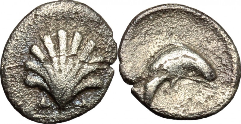 Greek Italy. Southern Apulia, Tarentum. AR Litra, 325-280 BC. D/ Shell. R/ Dolph...