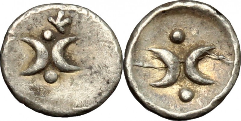 Greek Italy. Southern Apulia, Tarentum. AR Hemiobol, 325-280 BC. D/ Two crescent...