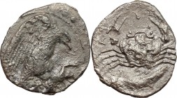 Sicily. Akragas. AR Hemidrachm, 413-406 BC. D/ Eagle standing right on hare. R/ Crab; below, fish. SNG Cop. 59-60. AR. g. 1.28 mm. 17.00 Dark brown pa...