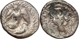 Sicily. Kamarina. AR Litra, 461-440 BC. D/ Nike flying right; below, swan. R/ Athena standing left, wearing aegis and holding spear; to right, shield....