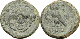 Sicily. Kamarina. AE, 425-405 BC. D/ Gorgoneion. R/ Owl standing left; holding lizard; in exergue, three pellets. CNS III, 21. AE. g. 3.14 mm. 14.00 A...