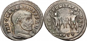 Maxentius (306-312). AE follis, Ostia mint, 309-312. D/ Head of Maxentius right, laureate. R/ Castor and Pollux standing facing each other; holding sc...