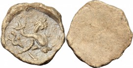 Uncertain mint. PB Tessera, 5th-4th century BC. D/ Dolphin right; behind, cornucopiae; below, caducaeus. R/ Blank. PB. g. 4.55 mm. 18.00 About VF.
