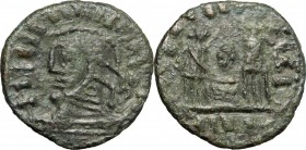 AE Imitation of a late Roman follis, 4th century. D/ Head of Constantine I (?) left, helmeted. R/ Two Victoriae standing facing each other; holding sh...