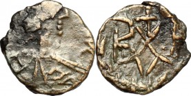 Ostrogothic Italy, Baduila (541-552). AE 2 1/2 Nummi, Ticinum mint, 541-552. D/ Head right. R/ Monogram. MIB 87. AE. g. 0.57 mm. 9.00 F.