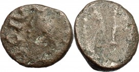Visigoths (?). AE Nummus, 6th century. D/ Bust left. R/ Monogram. AE. g. 1.10 mm. 10.00 About VF.