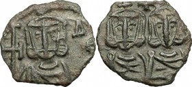 Theophilus (829-842). AE Follis, Syracuse mint, 829-842. D/ Bust of Theophilus facing, crowned; holding globus cruciger. R/ Busts of Michael II and Co...