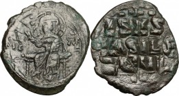 Constantine IX Monomachus (1042-1055). AE Follis, Constantinople mint, 1042-1055. D/ Christ Pantokrator enthroned, cross-nimbate; right hand raised in...