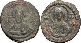 Romanus IV (1068-1071). AE Follis, Constantinople mint, 1068-1071. D/ Bust of Christ Pantokrator facing, cross-nimbate; holding scroll. R/ Bust of Vir...