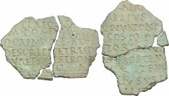 Fragment of bronze 'tabula' with inscription. Roman period, I-II century AD. 50 x 32 mm.