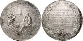 1907 Jamestown Tercentennial Exposition Award Medal. By Tiffany & Co. White Metal. About Uncirculated.
63 mm. Obv: Native American couple sitting on ...