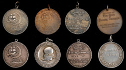 Lot of (4) New York American Newspaper Award Medals. By Tiffany & Co.
Looped for suspension. Included are: (3) 1909 New York Sunday American, Hudson-...