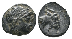 Aeolis. Aigai. (4.-3. Century BC). Bronze Æ. Obv: haed of Apollo right. Rev: Goat head right. Weight 0,74 gr - Diameter 8 mm