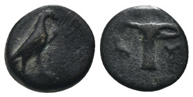 Aeolis. Kyme. (320-250 BC) Bronze Æ. Obv: eagle seated left. Rev: Oinochoe. Weight 1,02 gr - Diameter 9 mm