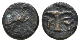 Aeolis. Kyme. (320-250 BC) Bronze Æ. Obv: eagle seated left. Rev: Oinochoe. Weight 1,07 gr - Diameter 8 mm