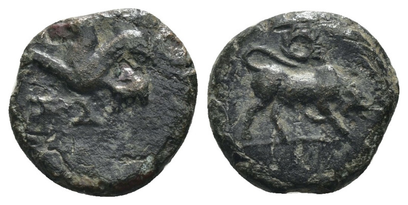 Caria. Kaunos. (350-300 BC) Bronze Æ. Obv: bull butting right. Rev: sphinx seate...