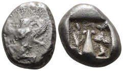 Caria. Kaunos. (430-410 BC) AR Stater. Obv: winged female figure running right holding kerykeion in right hand and wreath in left. Rev: baetyl with sm...