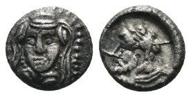 Cilicia. Tarsos. (379-374 BC) AR Obol. Obv: female head facing. Rev: male head left. Weight 0,42 gr - Diameter 6 mm