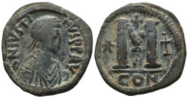 Justin I. (518-527 AD) Æ Follis. Constantinople. Obv: D N IVSTINVS P P AVG. diademed bust right. Rev: M between stars, cross above. Weight 17,66 gr - ...