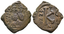 Justin II. and Sophia. (565-578 AD). 1/2 Follis. Nicomedia. Obv: Justin II. and Sophia enthroned facing. Rev: K A/N/N/O. Weight 6,71 gr - Diameter 25 ...