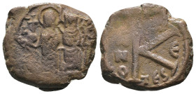 Justin II. and Sophia. (565-578 AD). 1/2 Follis. Thessalonica. Obv: Justin II. and Sophia enthroned facing. Rev: K A/N/N/O. Weight 5,46 gr - Diameter ...