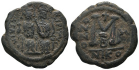 Justin II. and Sophia. (565-578 AD). Follis. Nicomedia. Obv: Justin II. and Sophia enthroned facing. Rev: ANNO / M. . Weight 1,35 gr - Diameter 11 mm