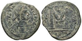 Justinian I. (527-565 AD) Æ Follis. Antioch. Obv: D N IVSTINIANVS PP AVI. diademed bust right. Rev: M between stars, cross above. . Weight 15,65 gr - ...