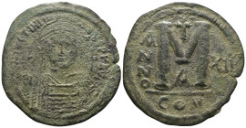 Justinian I. (527-565 AD) Æ Follis. Constantinople. Obv: crowned bust facing holding globus cruciger. Rev: ANNO M. . Weight 17,30 gr - Diameter 39 mm