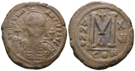 Justinian I. (527-565 AD) Æ Follis. Constantinople. Obv: crowned bust facing holding globus cruciger. Rev: ANNO M. Weight 19,00 gr - Diameter 33 mm