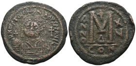 Justinian I. (527-565 AD) Æ Follis. Constantinople. Obv: crowned bust facing holding globus cruciger. Rev: ANNO M. Weight 20,05 gr - Diameter 38 mm