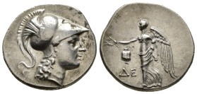 PAMPHYLIA. Side. Tetradrachm (Circa 205-100 BC). De-, magistrate.
Obv: Head of Athena right, wearing Corinthian helmet.
Rev: ΔE.
Nike advancing lef...