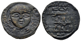 ARTUQIDS of MARDIN.Artuq Arslan.1201-1239 AD.No Mint. 623 AH.AE Dirham.
Obv : Draped facing male solar bust; name and title of Seljuq of Rum overlord...