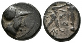 MACEDONIA. Antogonos II Gonatas. 277-239 a.C. A/ Athena con casco a derecha. R/ Pan caminando a derecha levantando trofeo, entre sus piernas monograma...