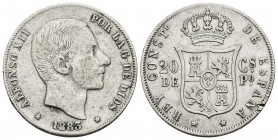 ALFONSO XII. 20 Centavos de Peso. 1883. Manila. Cal-90. Ar. 5,10g. Dos pruebas de metal en el canto. MBC-.
