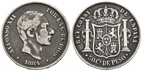 ALFONSO XII. 50 Centavos de peso. 1884. Manila. Cal-84. Ar. 12,73g. Pátina. MBC-. Escasa.