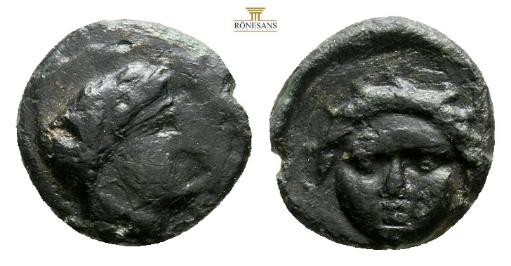 Greek Coins AE Bronze 0,59 g. 9,8 mm.