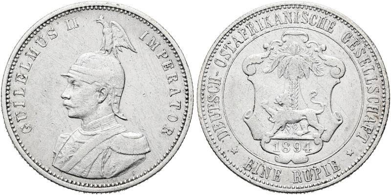 DEUTSCHE KOLONIEN. DEUTSCH OSTAFRIKA Rupie (11.55g). 1894 (A), Berlin. Behelmtes...